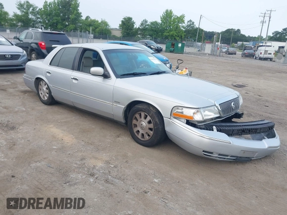 2003 Mercury Grand Marquis LS Premium z VIN 2MEFM75W03X658118, wystawiony jako IAAI lot #42435812 z przebiegiem 174 893 mil mil oraz . Historia ofert i sprzedaży dostępna na DreamBid. Obrazek 1.