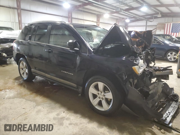 2011 Jeep Compass with VIN 1J4NT1FB8BD192253, listed as a Copart auction lot 87692135 with 0 mi miles and Salvage Title. Bid and sale history available at carsss.com. Image 4.