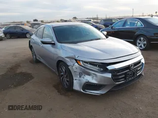 2021 Honda Insight Touring with VIN 19XZE4F99ME009749, listed as a IAAI auction lot 41411868 with 54,808 mi miles and . Bid and sale history available at carsss.com. Image 1.
