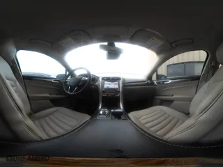 2019 Ford Fusion Hybrid SEL with VIN 3FA6P0MU6KR136726, listed as a IAAI auction lot 41071389 with 103,759 mi miles. Bid and sale history available at carsss.com. Image 18.