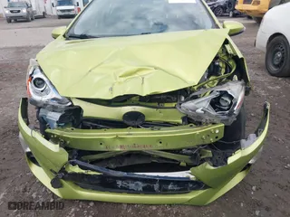 2015 Toyota Prius c One with VIN JTDKDTB36F1096872, listed as a IAAI auction lot 41202434 with 130,386 mi miles. Bid and sale history available at carsss.com. Image 6.