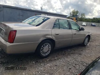 2004 Cadillac DeVille DHS z VIN 1G6KE57Y74U116879, wystawiony jako Copart lot #71017214 z przebiegiem 130 169 mil mil oraz Szkoda całkowita • Salvage title. Historia ofert i sprzedaży dostępna na DreamBid. Obrazek 3.