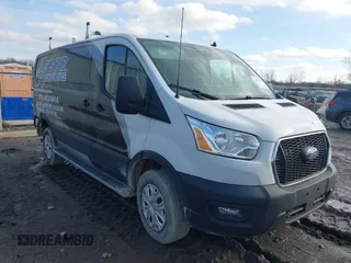 2021 Ford Transit Cargo with VIN 1FTBR1Y81MKA56330, listed as a IAAI auction lot 41063473 with 52,406 mi miles. Bid and sale history available at carsss.com. Image 1.
