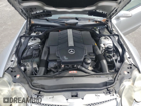 2005 Mercedes-Benz SL 500 with VIN WDBSK75F95F104935, listed as a Copart auction lot 60493705 with 89,994 mi miles and Salvage title. Bid and sale history available at DreamBid. Image 11.