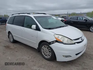 2007 Toyota Sienna XLE with VIN 5TDZK22C57S081282, listed as a IAAI auction lot 42154188 with 245,815 mi miles. Bid and sale history available at carsss.com. Image 1.