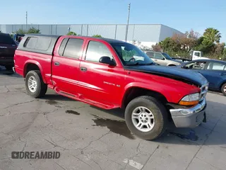 2001 Dodge Dakota Sport with VIN 1B7GG2AN51S148828, listed as a IAAI auction lot 42095653 with 232,995 mi miles and . Bid and sale history available at carsss.com. Image 1.