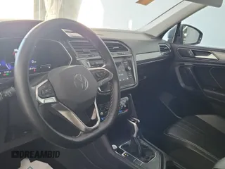 2024 Volkswagen Tiguan SE with VIN 3VV3B7AX8RM107014, listed as a IAAI auction lot 42734341 with 27,789 mi miles and . Bid and sale history available at DreamBid. Image 49.