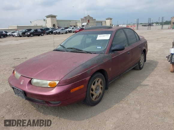 2002 Saturn SL z VIN 1G8ZF52802Z248375, wystawiony jako IAAI lot #42180352 z przebiegiem Nie podano mil oraz . Historia ofert i sprzedaży dostępna na DreamBid. Obrazek 6.