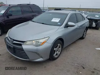 2015 Toyota Camry XLE with VIN 4T4BF1FKXFR472201, listed as a IAAI auction lot 41883944 with 143,296 mi miles and . Bid and sale history available at DreamBid. Image 18.