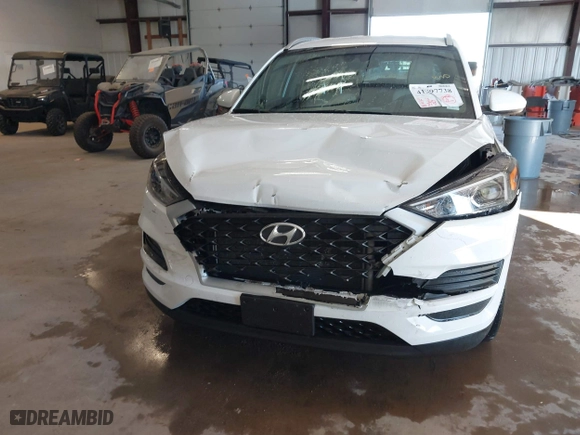 2019 Hyundai Tucson Value with VIN KM8J33A46KU066106, listed as a IAAI auction lot 41397738 with 41,717 mi miles. Bid and sale history available at carsss.com. Image 18.