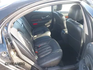 2002 Chrysler 300M M with VIN 2C3HE66G22H155440, listed as a IAAI auction lot 41517230 with 144,269 mi miles and . Bid and sale history available at DreamBid. Image 8.