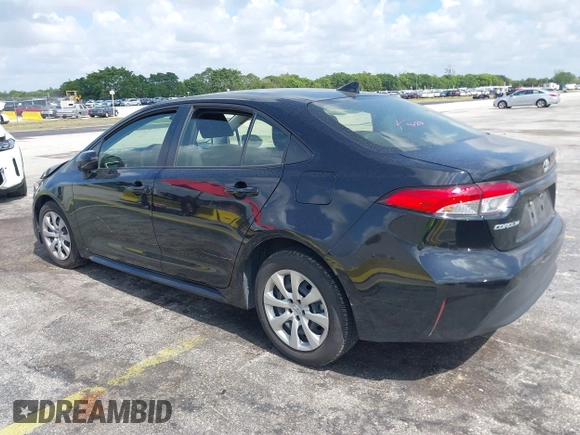 2023 Toyota Corolla LE with VIN JTDB4MEE2PJ004869, listed as a IAAI auction lot 42139964 with 41,119 mi miles. Bid and sale history available at carsss.com. Image 3.