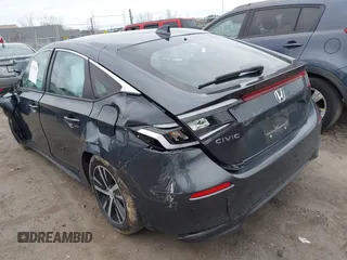2024 Honda Civic LX z VIN 19XFL2H5XRE023870, wystawiony jako IAAI lot #41776260 z przebiegiem Nie podano mil oraz . Historia ofert i sprzedaży dostępna na DreamBid. Obrazek 3.
