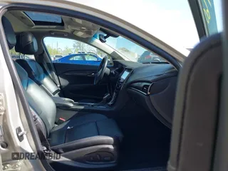 2014 Cadillac ATS Standard AWD z VIN 1G6AG5RXXE0167182, wystawiony jako IAAI lot #42103760 z przebiegiem 66 653 mil mil oraz . Historia ofert i sprzedaży dostępna na DreamBid. Obrazek 5.