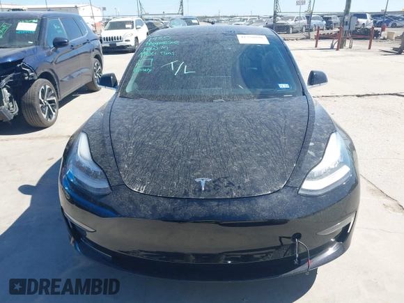 2020 Tesla Model 3 Standard Range Plus with VIN 5YJ3E1EAXLF614002, listed as a IAAI auction lot 41758898 with 42,363 mi miles and . Bid and sale history available at DreamBid. Image 12.