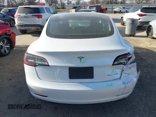 2023 Tesla Model 3 with VIN 5YJ3E1EAXPF436212, listed as a IAAI auction lot 41727400 with 81,011 mi miles and . Bid and sale history available at carsss.com. Image 16.
