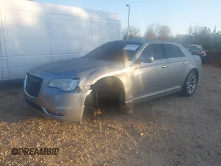 2016 Chrysler 300 with VIN 2C3CCAPG6GH167731, listed as a IAAI auction lot 41779615 with 127,679 mi miles. Bid and sale history available at carsss.com. Image 2.