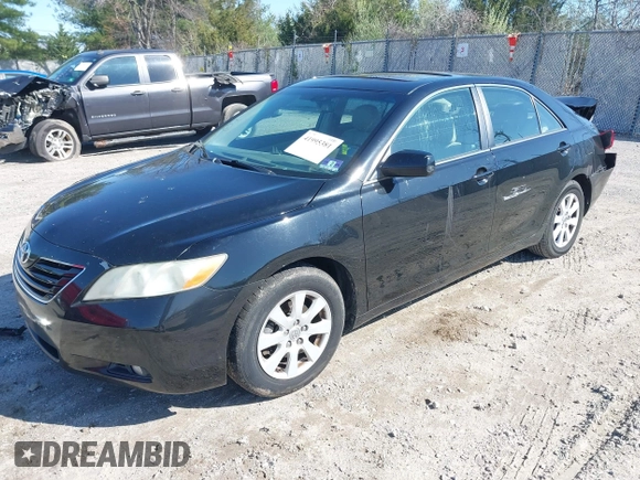 2009 Toyota Camry with VIN 4T1BE46K89U358717, listed as a IAAI auction lot 41995381 with 166,935 mi miles. Bid and sale history available at carsss.com. Image 2.