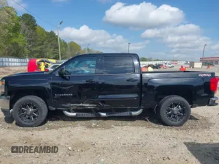 2017 Chevrolet Silverado 1500 LT with VIN 3GCUKREC3HG351205, listed as a IAAI auction lot 41961127 with 71,653 mi miles and . Bid and sale history available at DreamBid. Image 14.