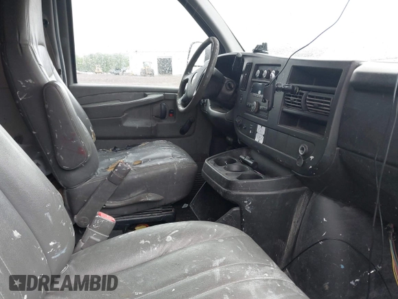 2012 Chevrolet Express Cargo with VIN 1GCWGFFA8C1108597, listed as a IAAI auction lot 42323808 with 200,965 mi miles and . Bid and sale history available at DreamBid. Image 5.