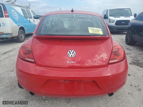 2012 Volkswagen Beetle 2.0T Turbo w/Sun/Sound with VIN 3VWV67ATXCM651866, listed as a Copart auction lot 43918205 with 94,896 mi miles and Salvage Title. Bid and sale history available at carsss.com. Image 7.