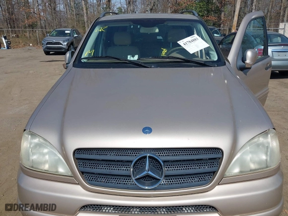 2001 Mercedes-Benz M-Class with VIN 4JGAB54E91A251754, listed as a IAAI auction lot 41784883 with 148,288 mi miles. Bid and sale history available at carsss.com. Image 10.