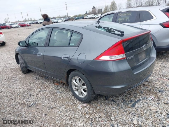 2010 Honda Insight EX with VIN JHMZE2H7XAS024879, listed as a IAAI auction lot 42029553 with 187,648 mi miles. Bid and sale history available at carsss.com. Image 3.