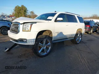 2015 GMC Yukon SLT with VIN 1GKS1BKC5FR240453, listed as a IAAI auction lot 41316793 with 1 mi miles. Bid and sale history available at carsss.com. Image 2.