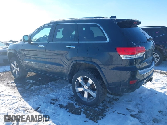 2015 Jeep Grand Cherokee Overland z VIN 1C4RJFCG3FC726748, wystawiony jako IAAI lot #41369715 z przebiegiem 120 905 mil mil oraz . Historia ofert i sprzedaży dostępna na DreamBid. Obrazek 3.