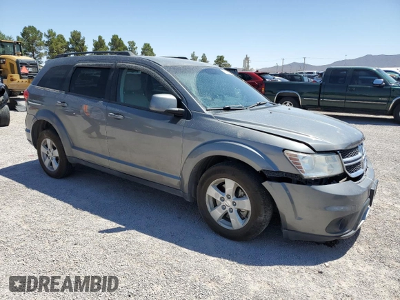 2012 Dodge Journey SXT z VIN 3C4PDDBG0CT345864, wystawiony jako Copart lot #55453875 z przebiegiem 142 444 mil mil oraz Szkoda całkowita • Salvage title. Historia ofert i sprzedaży dostępna na DreamBid. Obrazek 4.