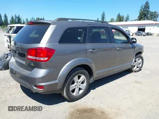 2012 Dodge Journey SXT с VIN 3C4PDCBG2CT363986, выставлен на аукционе IAAI как лот 42676110 с пробегом 75 020 миль миль и . История ставок и продаж доступна на DreamBid. Изображение 4.