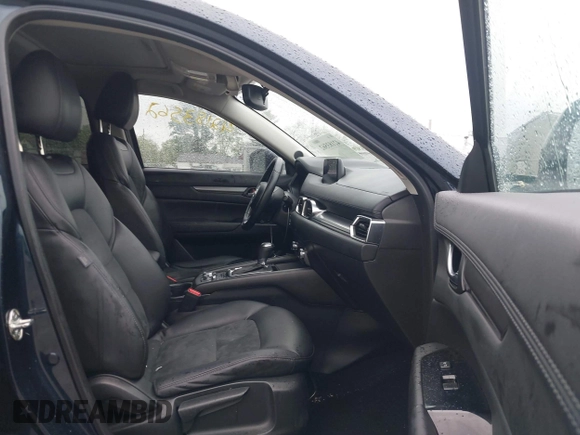 2017 Mazda CX-5 Touring z VIN JM3KFBCL4H0156571, wystawiony jako IAAI lot #42183562 z przebiegiem 135 595 mil mil oraz . Historia ofert i sprzedaży dostępna na DreamBid. Obrazek 5.