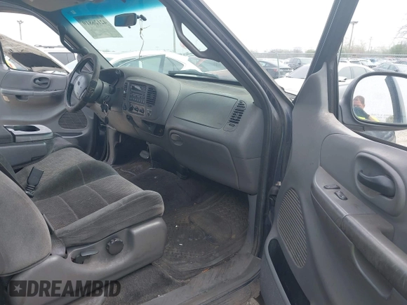 2002 Ford F-150 XL with VIN 1FTRX18W22NA26073, listed as a IAAI auction lot 42126819 with 212,893 mi miles and . Bid and sale history available at DreamBid. Image 5.