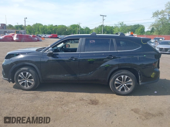 2023 Toyota Highlander L with VIN 5TDKDRBHXPS030361, listed as a IAAI auction lot 42230419 with 59,404 mi miles and . Bid and sale history available at DreamBid. Image 14.