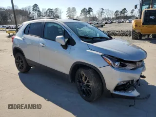 2022 Chevrolet Trax LT with VIN KL7CJPSMXNB568381, listed as a Copart auction lot 46663095 with 53,559 mi miles and Salvage title. Bid and sale history available at DreamBid. Image 4.