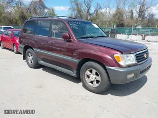 2002 Toyota Land Cruiser with VIN JTEHT05J422022565, listed as a IAAI auction lot 42042565 with 550,000 mi miles. Bid and sale history available at carsss.com. Image 1.