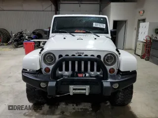 2008 Jeep Wrangler Unlimited Sahara с VIN 1J8GA59108L514034, выставлен на аукционе Copart как лот 58812215 с пробегом 191 800 миль миль и Списание • Salvage title. История ставок и продаж доступна на DreamBid. Изображение 5.