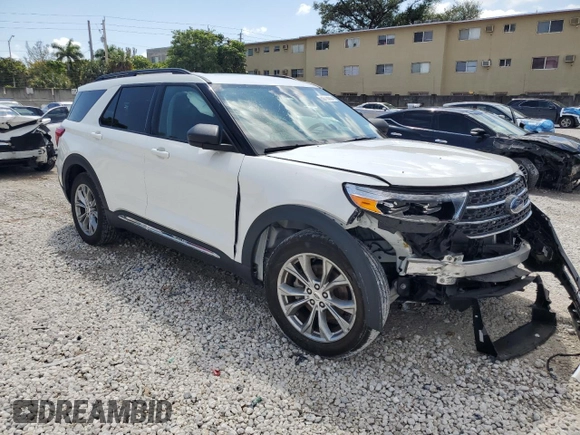 2022 Ford Explorer XLT with VIN 1FMSK8DH0NGB18321, listed as a Copart auction lot 50718605 with 21,047 mi miles and Salvage Title. Bid and sale history available at DreamBid. Image 4.