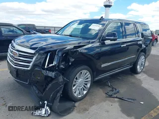 2015 Cadillac Escalade Platinum z VIN 1GYS4PKJ8FR568958, wystawiony jako IAAI lot #42316098 z przebiegiem 152 661 mil mil oraz . Historia ofert i sprzedaży dostępna na DreamBid. Obrazek 2.
