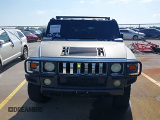 2003 Hummer H2 with VIN 5GRGN23U43H125114, listed as a IAAI auction lot 42160986 with 157,776 mi miles. Bid and sale history available at carsss.com. Image 12.