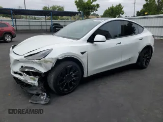 2023 Tesla Model Y Long Range with VIN 7SAYGDEEXPF744472, listed as a Copart auction lot 54109315 with 15,404 mi miles and Salvage Title. Bid and sale history available at DreamBid. Image 1.