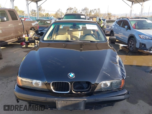 2000 BMW 5 Series 528iA with VIN WBADM6343YGU12629, listed as a IAAI auction lot 41963814 with 206,922 mi miles. Bid and sale history available at carsss.com. Image 12.