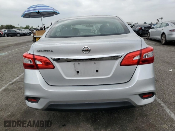 2018 Nissan Sentra S with VIN 3N1AB7AP3JY292546, listed as a Copart auction lot 54179745 with 148,285 mi miles and Salvage Title. Bid and sale history available at DreamBid. Image 6.