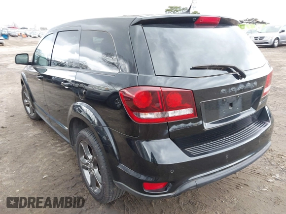 2015 Dodge Journey Crossroad with VIN 3C4PDCGG9FT556973, listed as a IAAI auction lot 41725543 with 123,677 mi miles and . Bid and sale history available at DreamBid. Image 3.