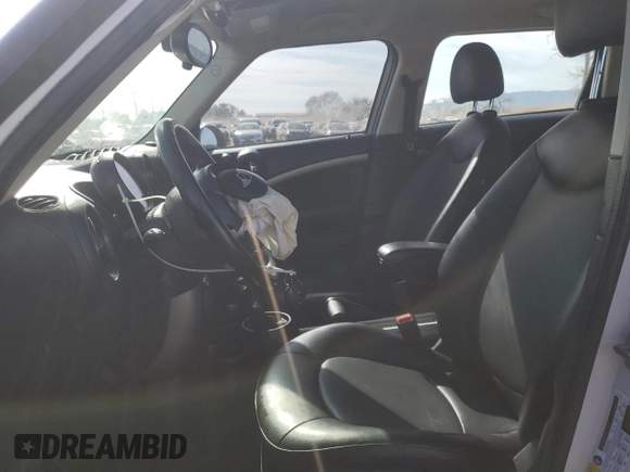 2016 MINI Countryman with VIN WMWZB3C50GWR49868, listed as a Copart auction lot 45771525 with 107,823 mi miles and Salvage title. Bid and sale history available at DreamBid. Image 7.