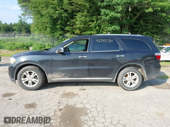 2013 Dodge Durango Crew with VIN 1C4RDJDG1DC698969, listed as a IAAI auction lot 42740024 with 199,758 mi miles and . Bid and sale history available at DreamBid. Image 14.