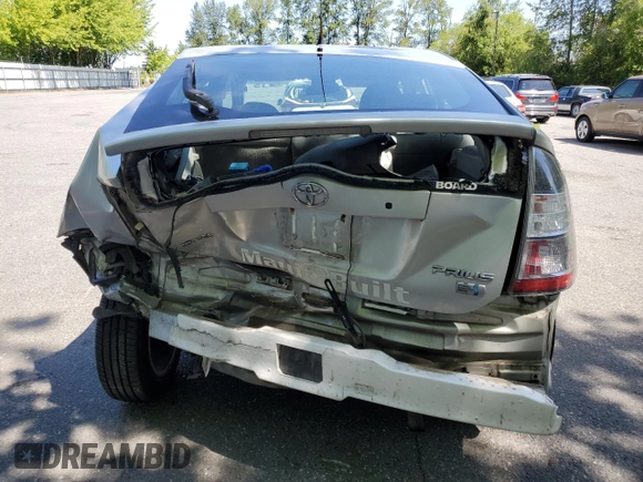 2005 Toyota Prius z VIN JTDKB20U053065387, wystawiony jako Copart lot #58809325 z przebiegiem 249 936 mil mil oraz Szkoda całkowita • Salvage title. Historia ofert i sprzedaży dostępna na DreamBid. Obrazek 6.