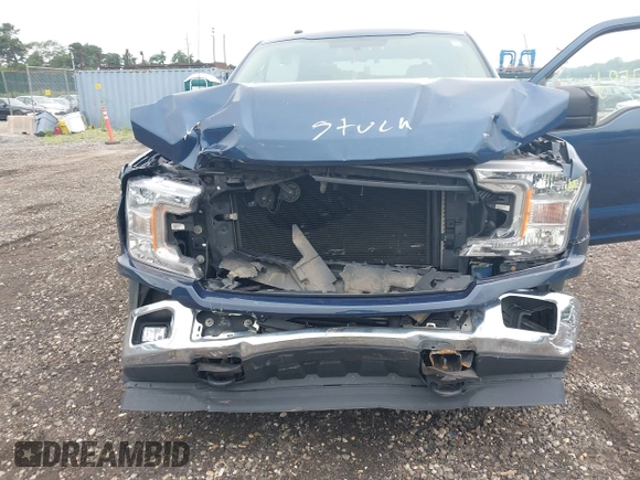 2018 Ford F-150 XL with VIN 1FTEW1EP6JKF00220, listed as a IAAI auction lot 42669759 with 93,996 mi miles and . Bid and sale history available at DreamBid. Image 6.