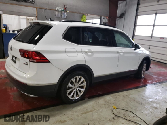 2018 Volkswagen Tiguan SEL with VIN 3VV2B7AX9JM065985, listed as a Copart auction lot 79404694 with Not provided miles and Salvage title. Bid and sale history available at DreamBid. Image 3.
