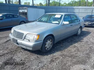 1995 Mercedes-Benz S z VIN WDBGA43E0SA254443, wystawiony jako IAAI lot #42168405 z przebiegiem 88 156 mil mil oraz . Historia ofert i sprzedaży dostępna na DreamBid. Obrazek 2.
